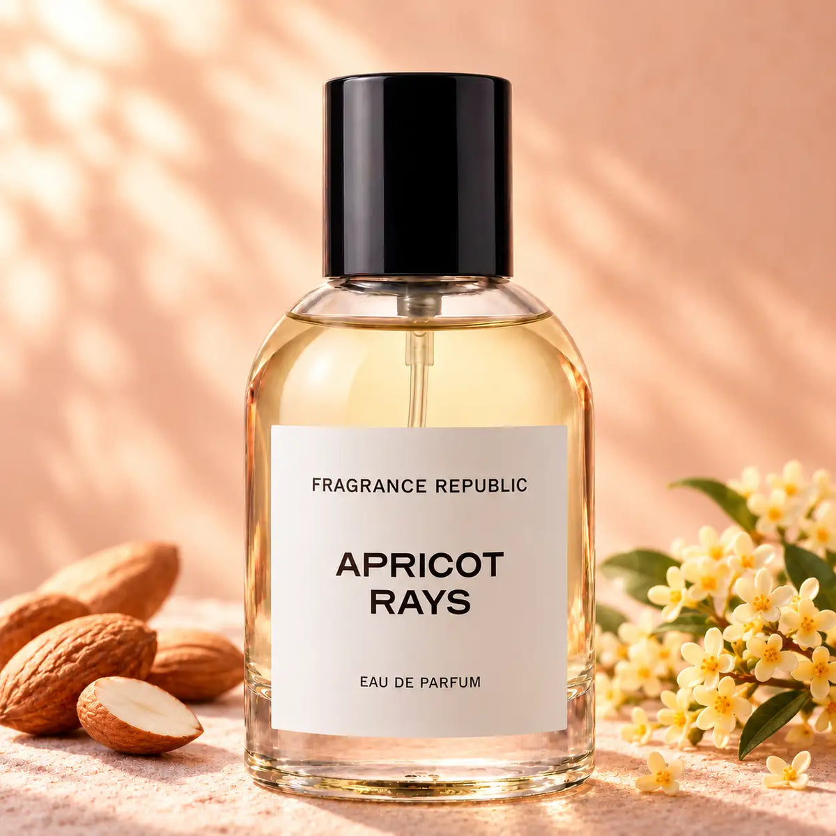 Fragrance Republic Apricot Rays eau de parfum bottle beside almonds and pale flowers.