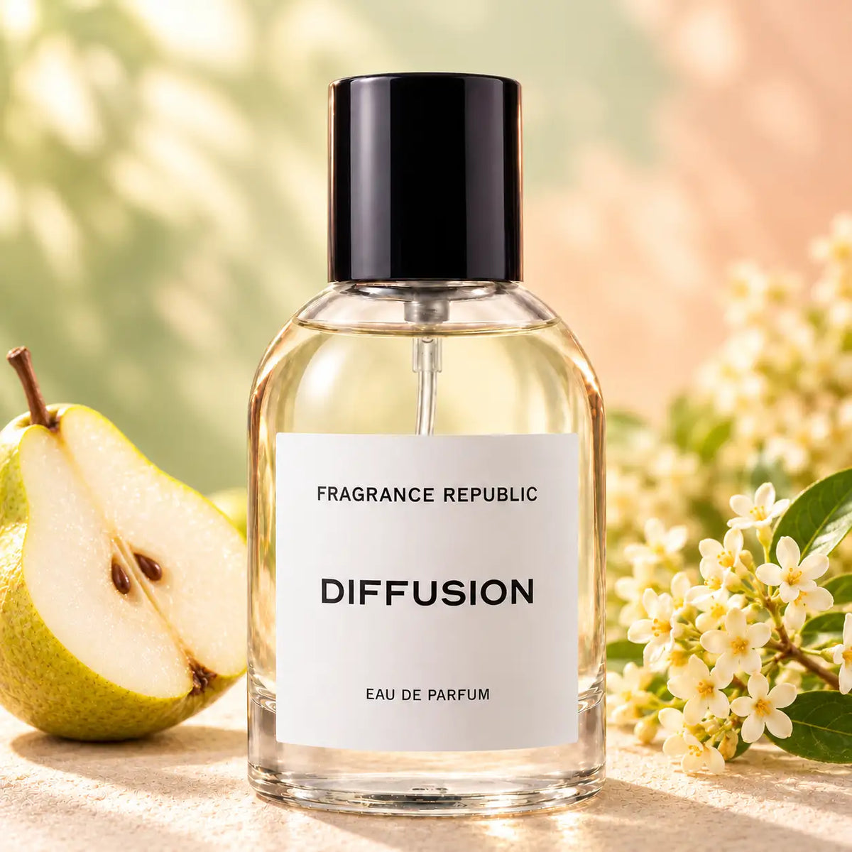Fragrance Republic Diffusion eau de parfum bottle beside pear and small white flowers.