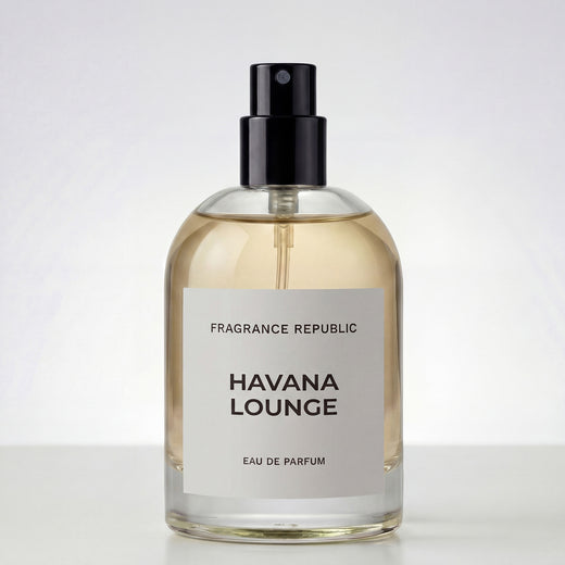 Clear glass bottle of Havana Lounge eau de parfum with black spray top on white background