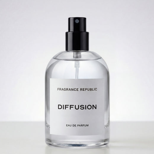Clear glass bottle of Diffusion Eau de Parfum with black spray top and minimalist label