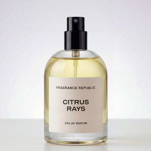 Clear glass perfume bottle with black spray cap labeled 'Citrus Rays Eau de Parfum'