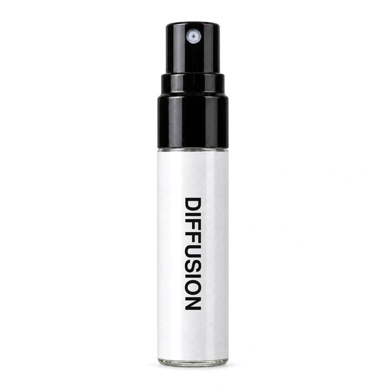 Fragrance Republic Diffusion sample perfume spray with its black nozzle and white label.