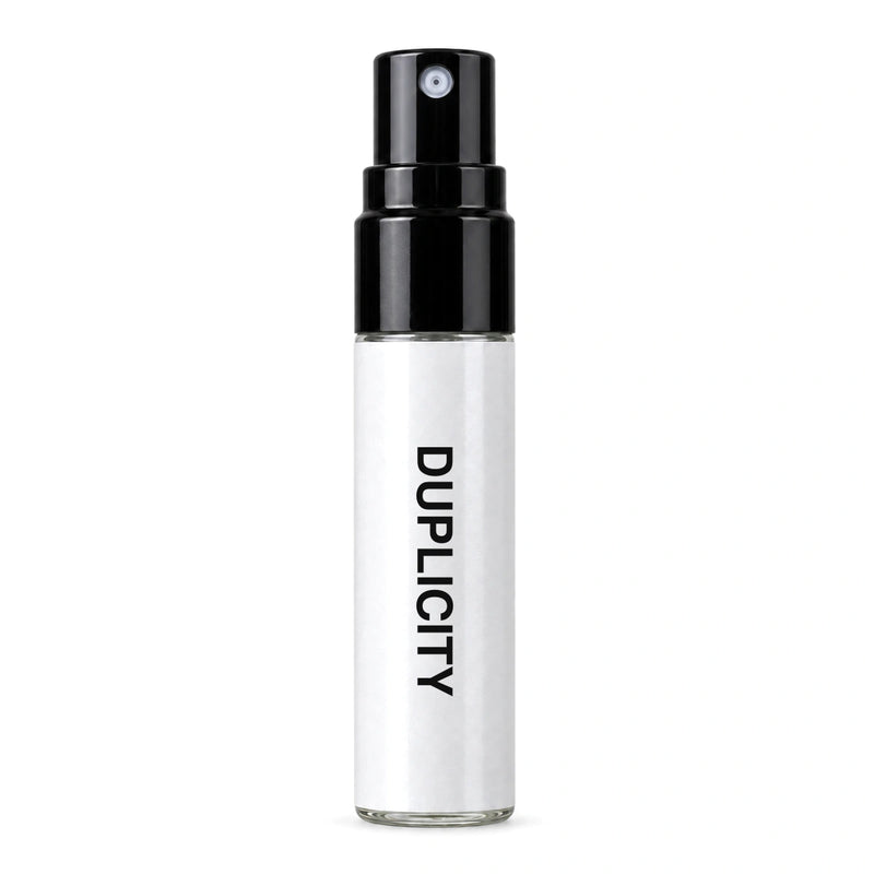 Fragrance Republic Duplicity sample perfume spray with its black nozzle and white label.