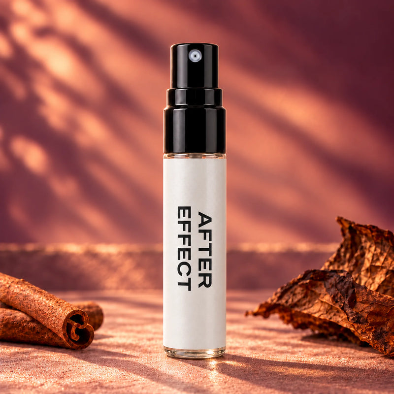 Fragrance Republic After Effect 5ml perfume sample spray beside cinnamon and dried tobacco leaves.