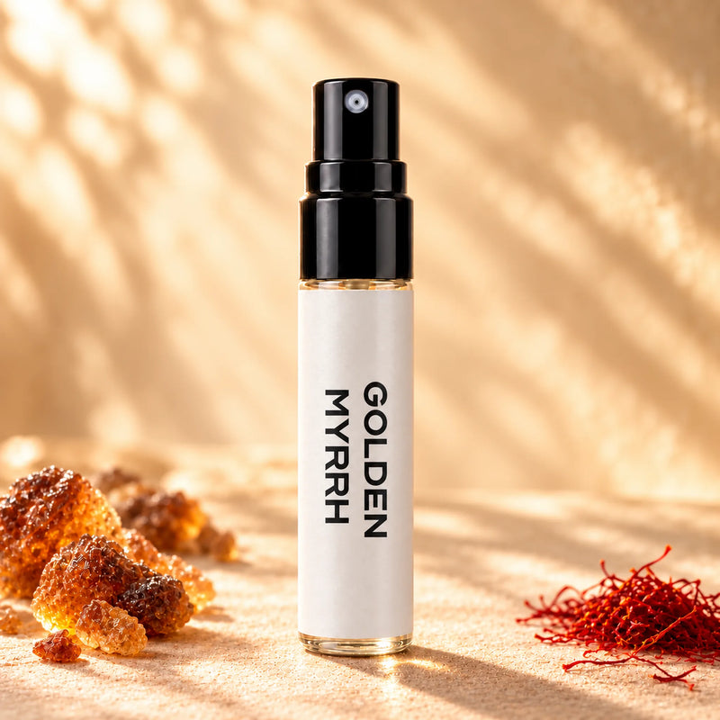 Fragrance Republic Golden Myrrh 5ml perfume sample spray beside amber-coloured resin and saffron.