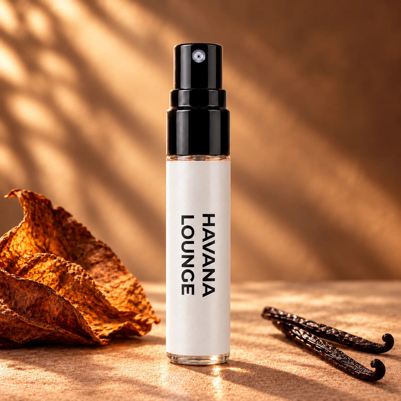 Fragrance Republic Havana Lounge 5ml perfume sample spray beside dried tobacco leaves and vanilla pods.