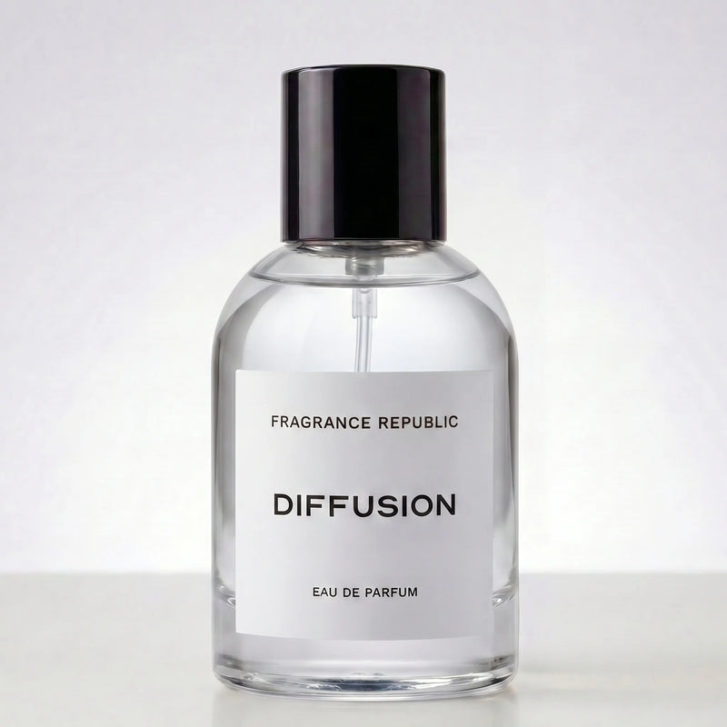 Fragrance Republic Diffusion perfume bottle with black cap on a pale background.