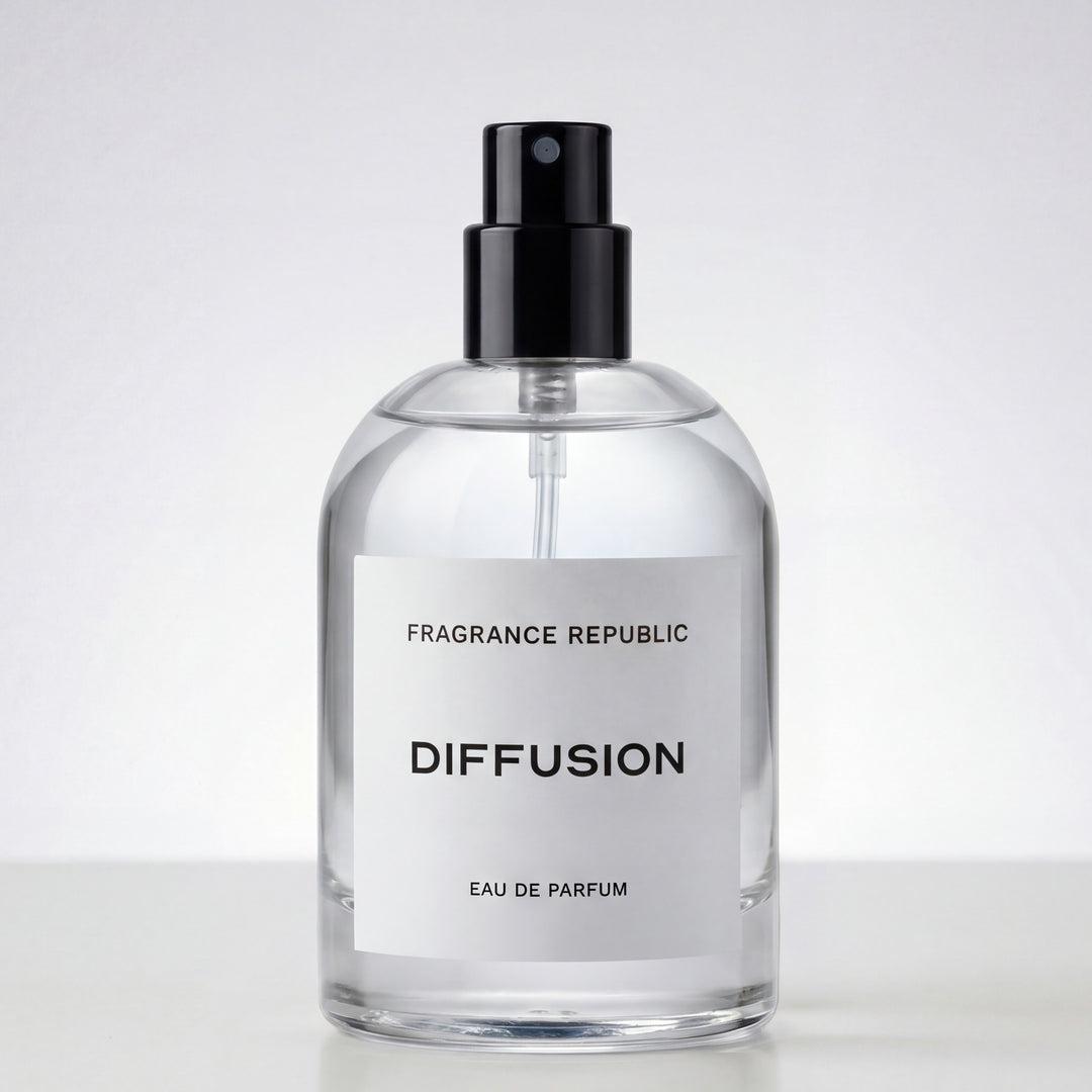 Clear glass bottle of Diffusion Eau de Parfum with black spray top and minimalist label