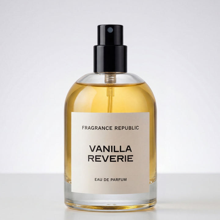 Clear glass spray bottle of Vanilla Reverie eau de parfum with amber liquid on white background