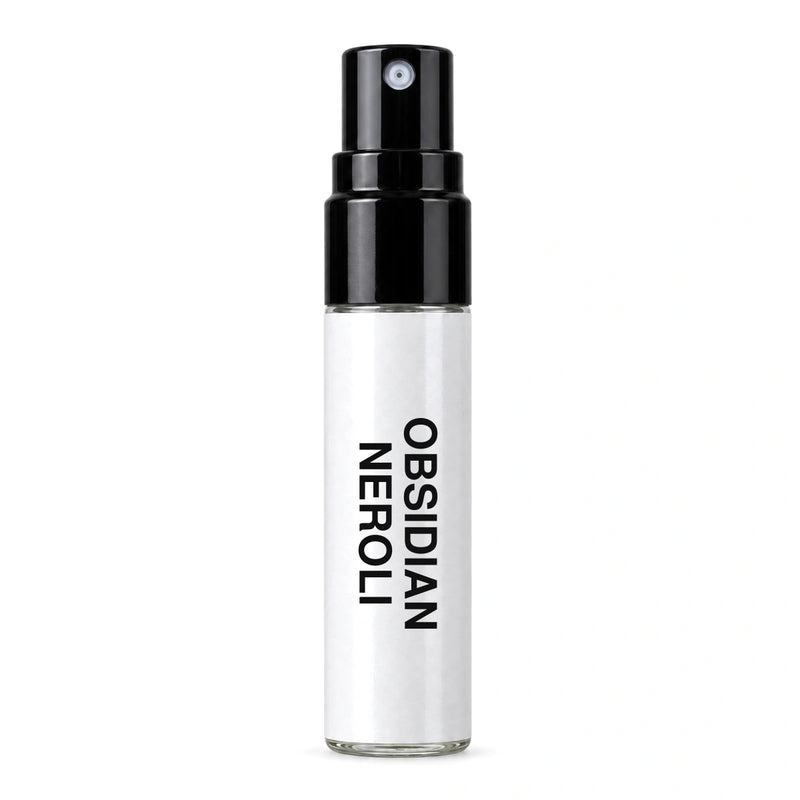 Fragrance Republic Obsidian Neroli sample perfume spray with its black nozzle and white label.