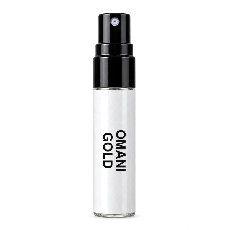 Fragrance Republic Omani Gold sample perfume spray with its black nozzle and white label.