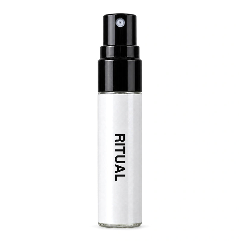Fragrance Republic Ritual sample perfume spray with its black nozzle and white label.